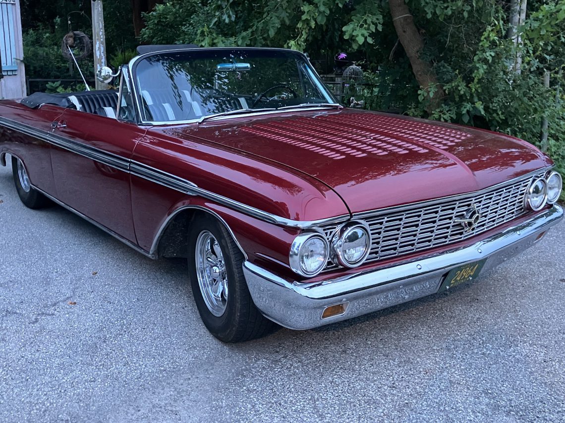 An image of a red Ford Galaxy - photo by Amy Logan